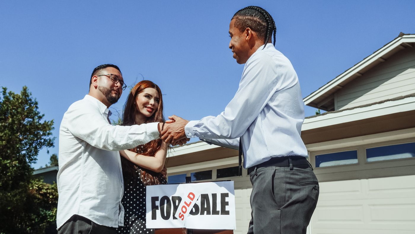 Couple celebrating their first home purchase